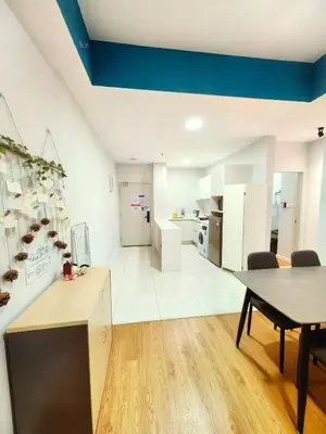 a kitchen and dining room with a table and chairs at Chamber Resident Service KLCC in Kuala Lumpur
