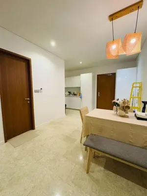 a room with a bed and a dining room at URBAN COZY HOME at SkySuites Near KLCC Complimentary Breakfast in Kuala Lumpur