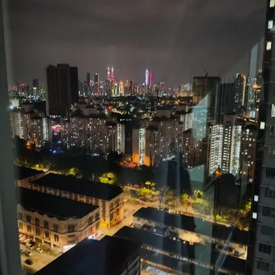 a view of a city skyline at night at One Bedroom Apartment at Kuala Lumpur in Kuala Lumpur