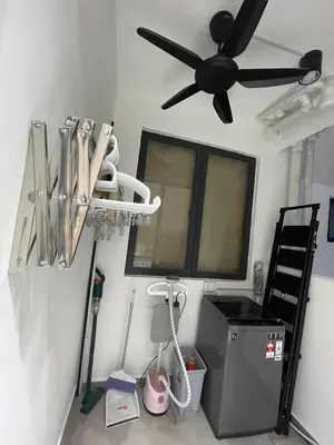 a room with a ceiling fan and utensils on a wall at RumaDuke Kuala Lumpur with Netflix and KLCC Views in Kuala Lumpur