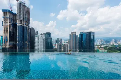 a swimming pool on top of a city skyline at Dorsett Residence Kuala Lumpur #21 in Kuala Lumpur