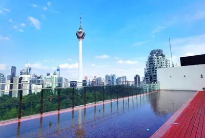 a view of the city from the roof of a building at Red M101 Dang Wangi By Oak Tree in Kuala Lumpur