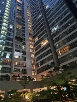 a view of tall buildings at night at Regalia residence KLCC By Glory Homes in Kuala Lumpur