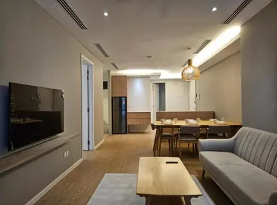 a living room with a couch and a table at Binjai 8 KLCC in Kuala Lumpur