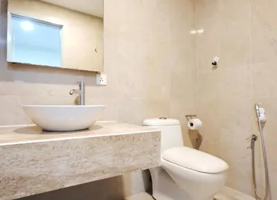 a bathroom with a sink and a toilet at Bintang Fairlane Residence #83 KLCC Pavilion in Kuala Lumpur