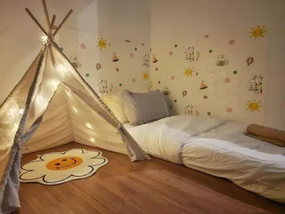 a bedroom with a bed with a tent in it at Family Suite M Vertica Sunway Velocity Ikea KL MRT in Kuala Lumpur