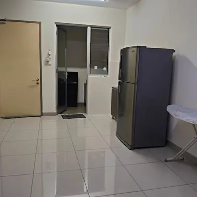 a kitchen with a stainless steel refrigerator in a room at 2 Rooms Apartment at Kuala Lumpur in Kuala Lumpur