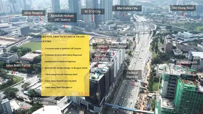 an overhead view of a city with a yellow sign at The Adina - Bangsar Trade Centre in Kuala Lumpur