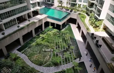 an overhead view of a building with a swimming pool at Stay at Regalia KLCC View Sky Pool in Kuala Lumpur