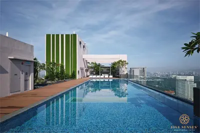 a swimming pool on the roof of a building at Riveria Signature Suites, KL Sentral in Kuala Lumpur