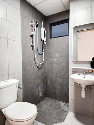 a bathroom with a shower and a toilet and a sink at Flora Residency KL -- Botanical Vibes #3BR2B #1-7 pax by Cowidea in Kuala Lumpur