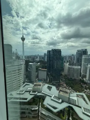 a view of a city skyline with a tower at URBAN SKY HOME NEAR KLCC Complementary Breakfast in Kuala Lumpur