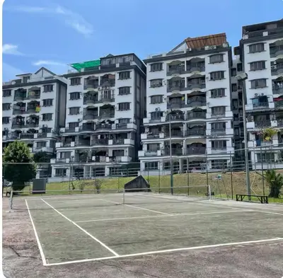 a tennis court in front of a large apartment building at Condo in kuala lumpur in Kuala Lumpur