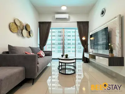 a living room with a couch and a tv at Salak Selatan Pool View with Wifi & Netflix 4PAX in Kuala Lumpur