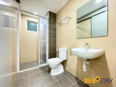 a bathroom with a toilet and a sink and a shower at Salak Selatan Pool View with Wifi & Netflix 4PAX in Kuala Lumpur