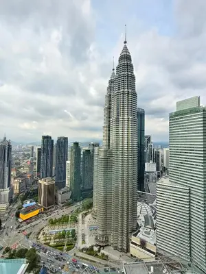 a view of a city skyline with a tall building at Sky suites KLCC by Kuala Lumpur Family Room Stay in Kuala Lumpur