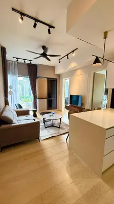 a living room with a couch and a table at Star Suites KLCC by flixses in Kuala Lumpur