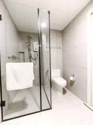 a bathroom with a shower and a toilet at The Atrium Ampang by OKBnB - Family Suite 3-Minute Access to the Heart of KL in Kuala Lumpur