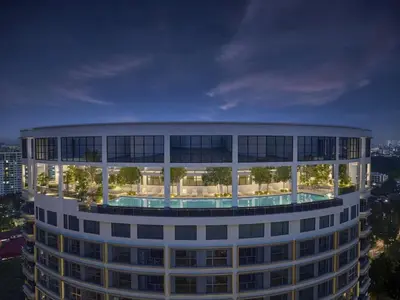 a building with a pool in the middle of it at The Atrium Ampang by OKBnB - Family Suite 3-Minute Access to the Heart of KL in Kuala Lumpur