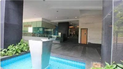 a lobby of a building with a swimming pool at 0111 Sweet Home-Casa Residency 2R 2B City View in Kuala Lumpur