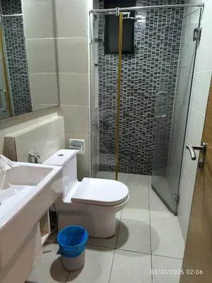 a bathroom with a toilet and a sink and a shower at 0111 Sweet Home-Casa Residency 2R 2B City View in Kuala Lumpur