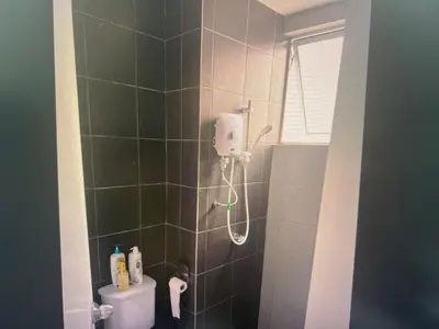 a bathroom with a shower with a toilet in it at Pixel City Sentral Studio Walk to Lrt1Min KLCC in Kuala Lumpur