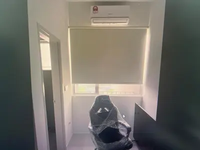 a room with a bag on the floor next to a window at Pixel City Sentral Studio Walk to Lrt1Min KLCC in Kuala Lumpur