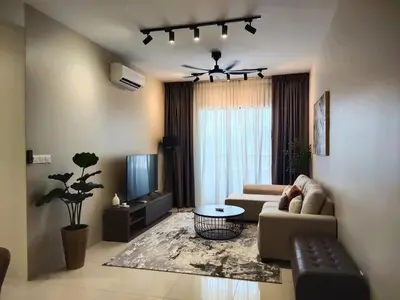 a living room with a couch and a tv at Vista Sentul WIFI AnDroidTV 8KM to KLCC in Kuala Lumpur