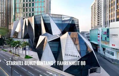 a building in the middle of a city at Dorsett Residence Kuala Lumpur #08 TRX KLCC Pavilion in Kuala Lumpur