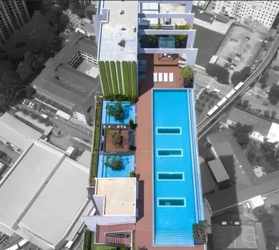 an architectural rendering of a building with a pool at Reveria city KL in Kuala Lumpur