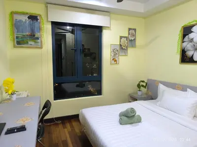 a bedroom with a bed with a hat on it at 0267 Sweet Home-Casa Residency 1R 1B in Kuala Lumpur