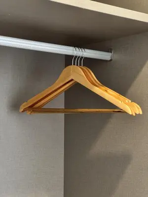 a wooden hanger hanging from a ceiling at DRapport APT got Bathtub & Kids Game by Iconique in Kuala Lumpur