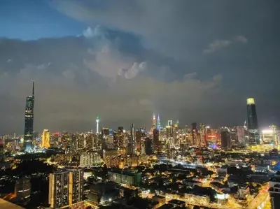 a view of a large city at night at Trion KL By HomeTaric Suite in Kuala Lumpur