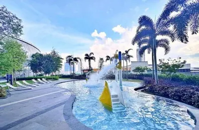 a water feature in a park with a fountain at Trion KL By HomeTaric Suite in Kuala Lumpur