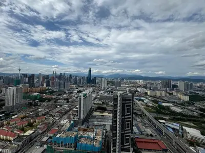 an aerial view of a large city with buildings at Trion KL, Jalan Chan Sow Lin, Kuala Lumpur by One Guesthouse in Kuala Lumpur
