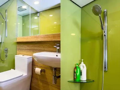 a bathroom with a sink and a toilet and a shower at Sky Suites KLCC Premium Stay in Kuala Lumpur