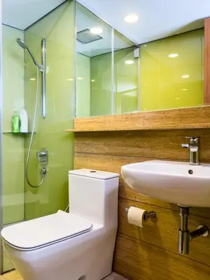 a bathroom with a toilet and a sink at Sky Suites KLCC Premium Stay in Kuala Lumpur