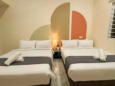 a room with two beds with teddy bears on them at Private Pool SemiD 5 Min Walk SunwayVelocity Max 21 Pax in Kuala Lumpur