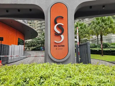 a sign for a city sites sign on a building at The Sky Suites KLCC by the Park in Kuala Lumpur