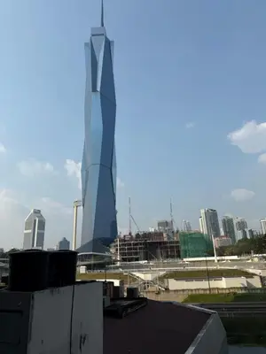 a view of a tall building in a city at Opus Residence in Kuala Lumpur
