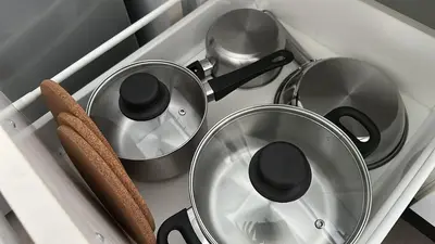 a stove top with pots and pans on it at The Establishment Bangsar #19 by Ouki in Kuala Lumpur