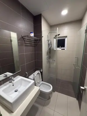 a bathroom with a sink and a toilet and a shower at Sentrio Pandan KL KLCC View Kuala Lumpur 37 in Kuala Lumpur