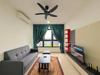 a living room with a couch and a ceiling fan at M Vertica Cheras by RASBO Galaxy Suites in Kuala Lumpur