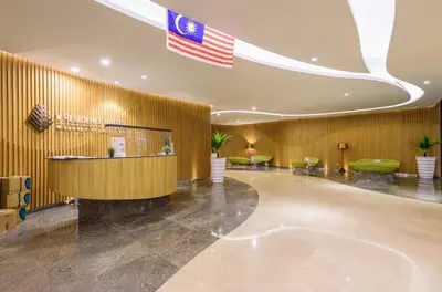 a lobby with an american flag on the wall at Sunway Velocity in Kuala Lumpur