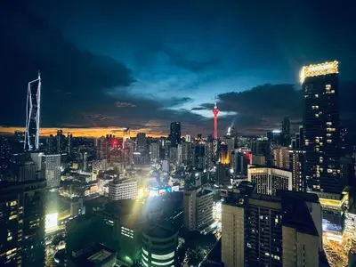 a view of a city at night at AXON Bukit Bintang Suites KL in Kuala Lumpur
