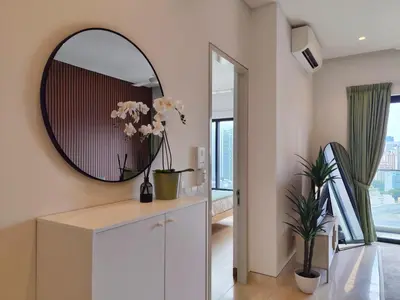 a dressing room with a mirror and a dresser at Lucentia Residence, Bukit Bintang City Centre in Kuala Lumpur