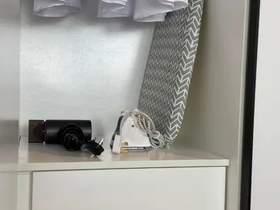 a camera sitting on top of a dresser at Weekly Monthly Stay - Bangsar Trade Centre Benton in Kuala Lumpur