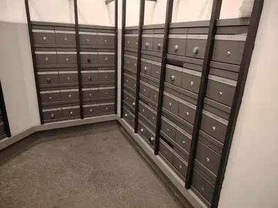 a room with lockers in a building at The MEWS KLCC By Arman in Kuala Lumpur