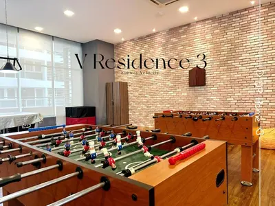 a room with a table with a pool table at 2Room 8pax Link to Velocity Mall MRT KL in Kuala Lumpur