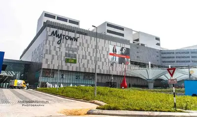 a large building with a sign on the side of it at 2Room 8pax Link to Velocity Mall MRT KL in Kuala Lumpur